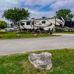 photo of rv site and 5th wheel rv